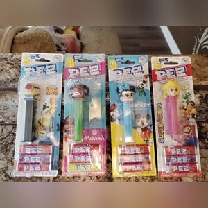 PEZ Licensed Character Candy Dispenser Assortment - Blue, Black, Green, Pink